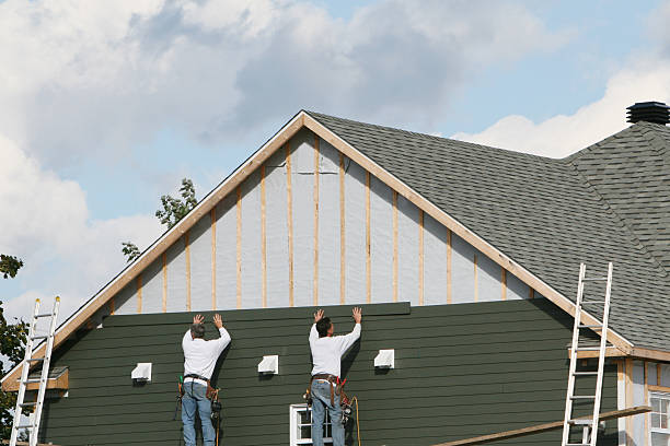 Professional Siding technician working in Fulton, NY